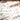 //thecutestlittle.com/cdn/shop/files/FrenchFlowersBibs3_345x0.webp?v=1756582323